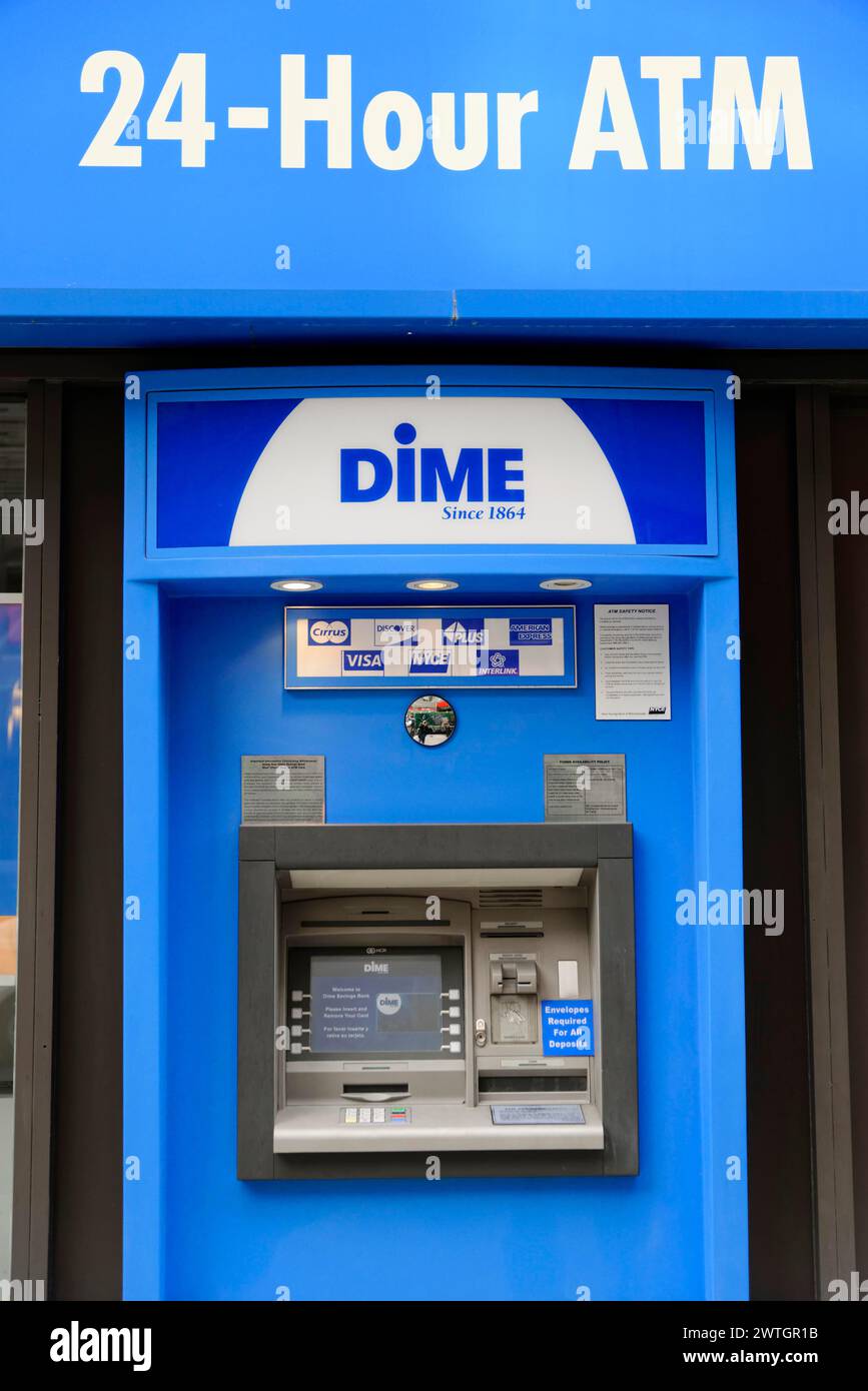 DIME Bank 24-hour ATM with blue facade and security stickers, Manhattan, New York City, New York, USA, North America Stock Photo