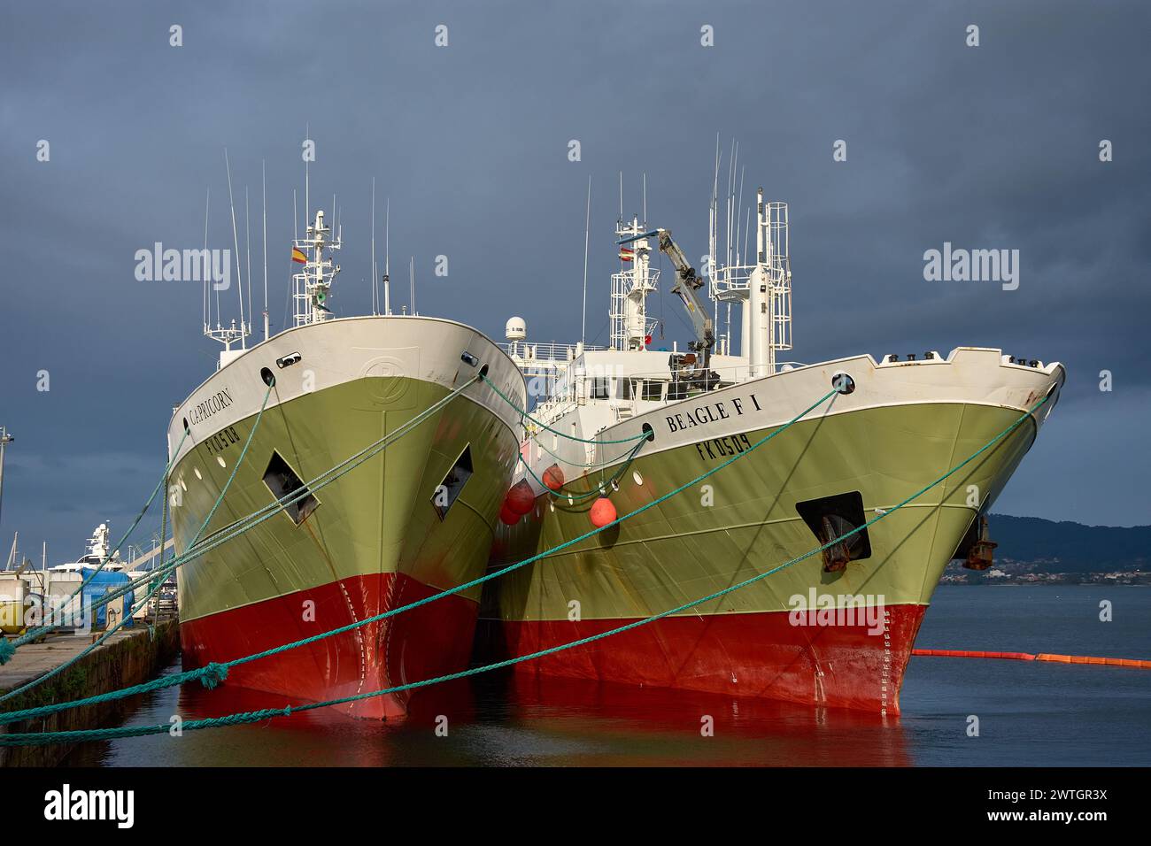 Vigo, Pontevedra, Spain; December 18, 2022; Two freezer trawlers the Capricorn and the Beagle seen from the bow with rust docked in the port of Vigo o Stock Photo