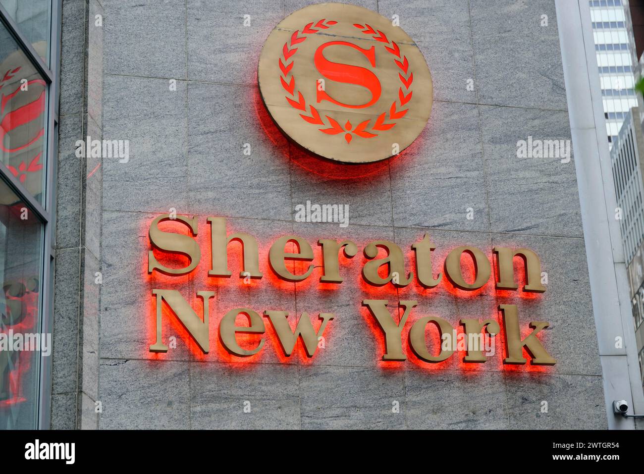 The glowing neon sign 'Sheraton New York' on a building facade, Manhattan, New York City, New York, USA, North America Stock Photo
