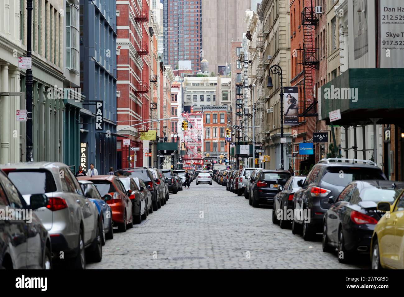 A busy city street with parked cars and historic buildings, Manhattan, New York City, New York, USA, North America Stock Photo
