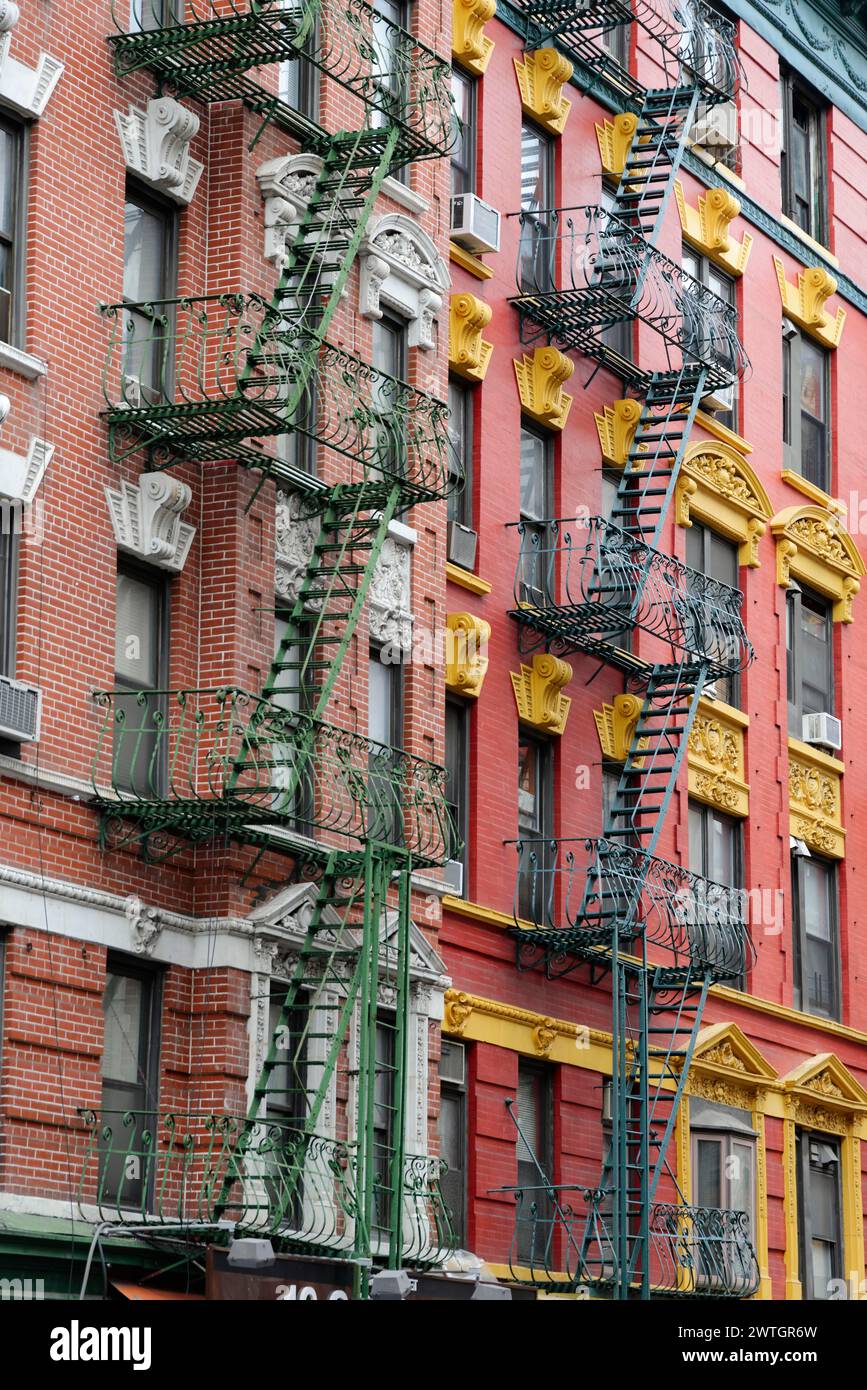 Colourful fire escape on the rustically decorated building facade, Manhattan, New York City, New York, USA, North America Stock Photo