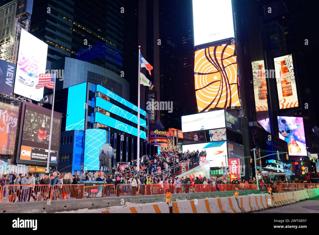 The lively Times Square at night with colourful neon signs and crowds of people, Manhattan, New York City, New York, USA, North America Stock Photo