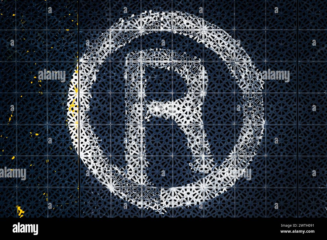 R Registered trademark symbol on non slip plastic flooring, close up Stock Photo