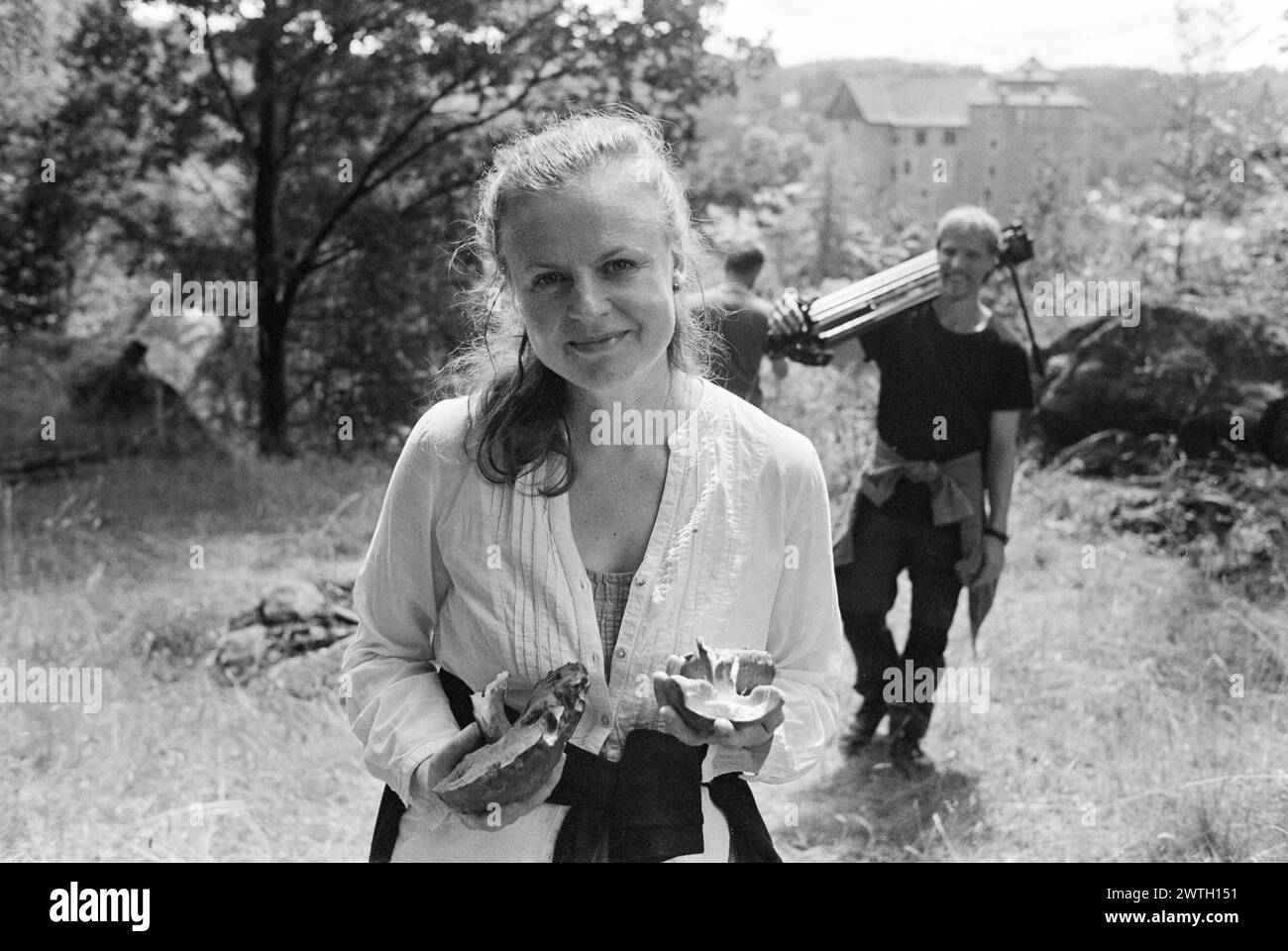 Documentary filmmaker Theodora Remundova holds mushrooms found during the filming of a documentary film at the castle Becov nad Teplou, 12 July 2021. Stock Photo