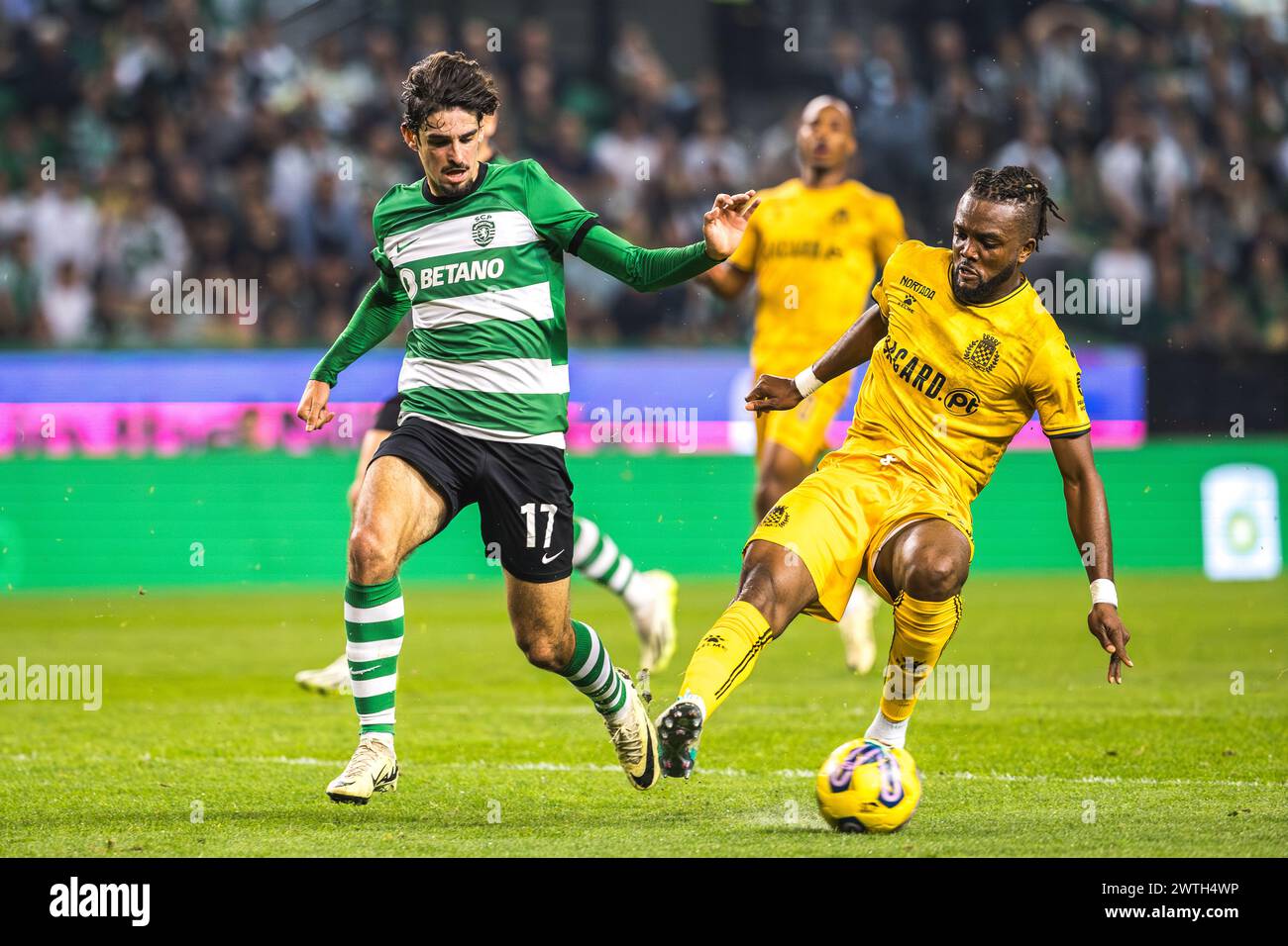Lisbon, Portugal. 17th Mar, 2024. Francisco Trincao of Sporting CP (L) and Chidozie Awaziem of Boavista FC (R) in action during the Liga Portugal Betclic match between Sporting CP and Boavista FC at Estadio Jose Alvalade. (Final score: Sporting CP 6 - 1 Boavista FC) Credit: SOPA Images Limited/Alamy Live News Stock Photo