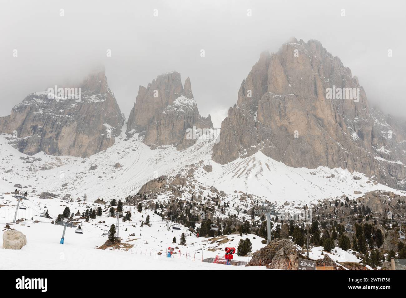 Snowy ski lodge in the mountains of the Dolomites, Italy Stock Photo