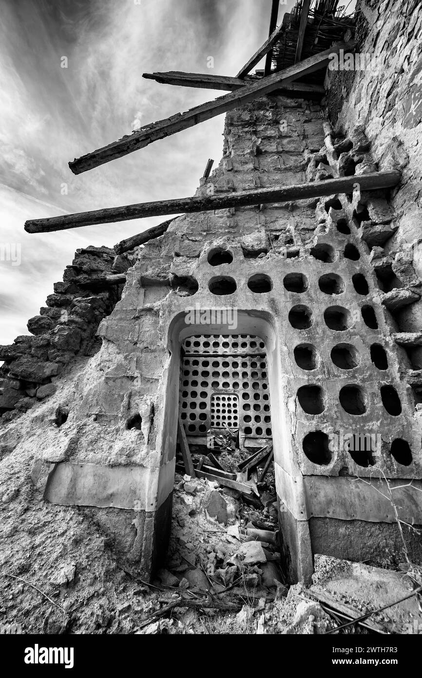 Abandoned dovecote in black and white in Alhambra Stock Photo