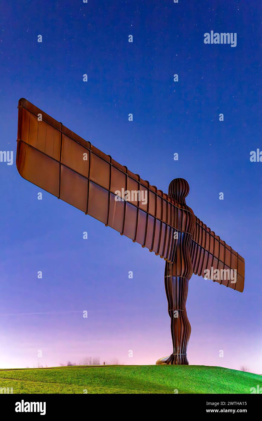 A view of the Angel of the North sculpture in Gateshead at night with clear skies and lots of stars shining Stock Photo