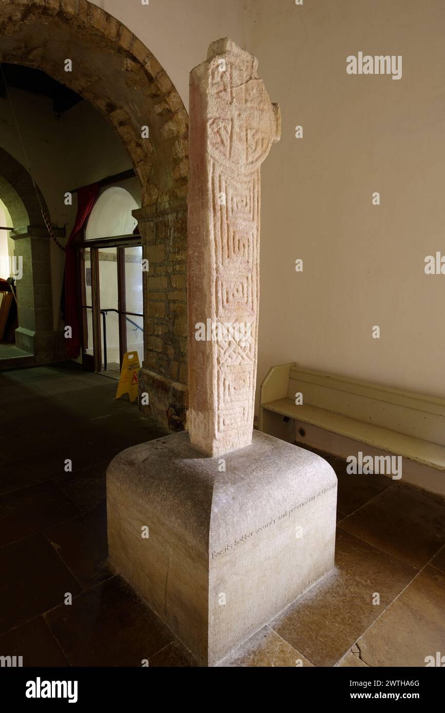 Cross, Penmon Priory, Church, Penmon, Llangoed,   Anglesey, North Wales, United Kingdom. Stock Photo