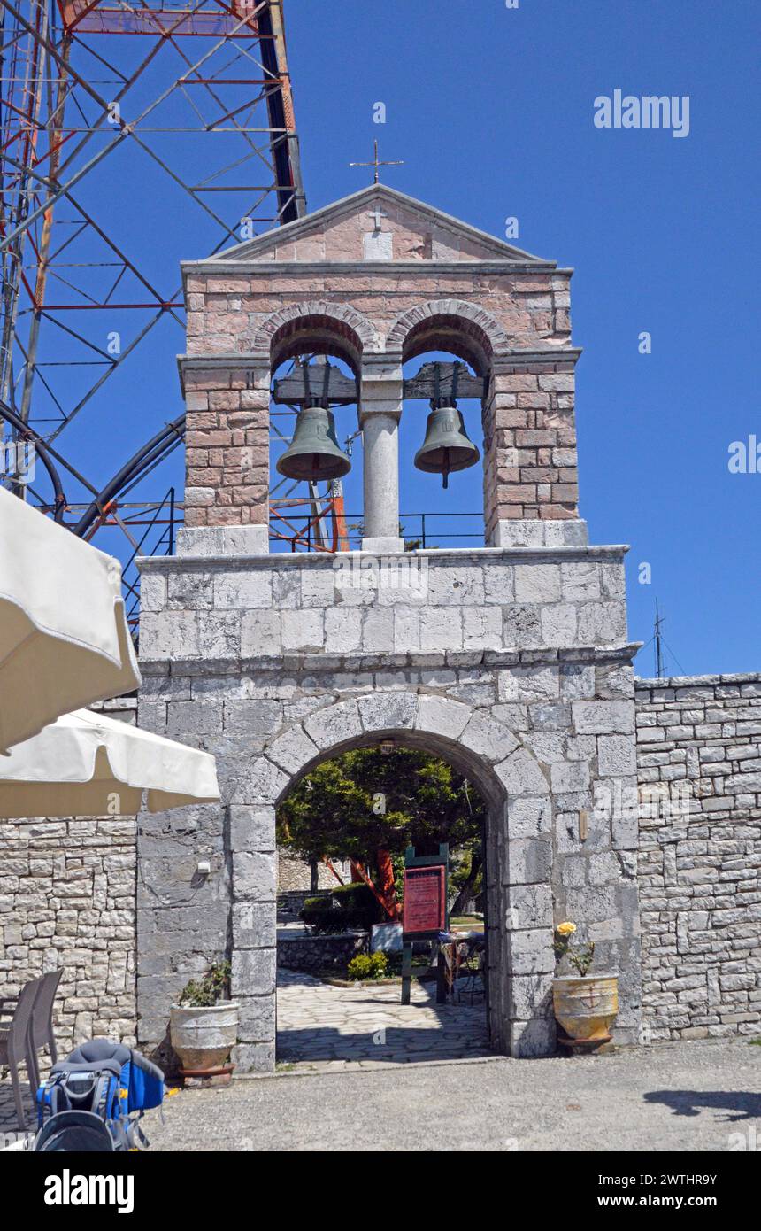 Greece, Island of Corfu, summit of Mount Pantokrator (914 metres):  entrance and belltower to the Orthodox monastery of Ypsilou Pantokratora, with the Stock Photo