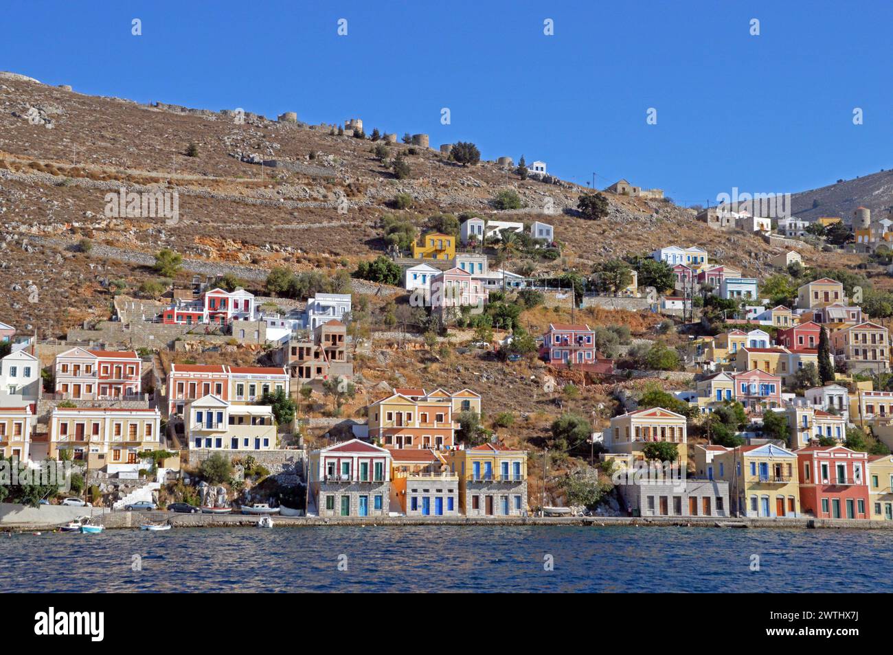Greece, Island of Symi: a colourful array of classical facades on the ...
