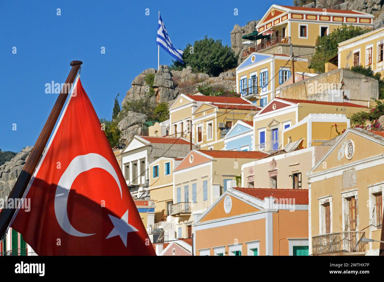 Greece, Island of Symi: a colourful array of classical facades on the ...