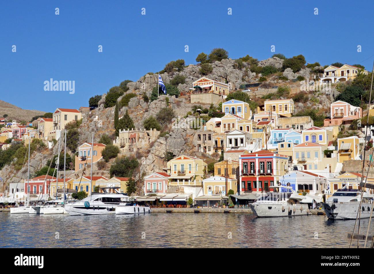Greece, Island of Symi: a colourful array of classical facades on the ...