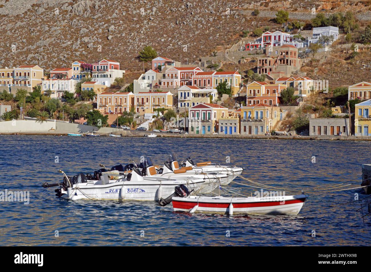 Greece, Island of Symi: a colourful array of classical facades on the ...