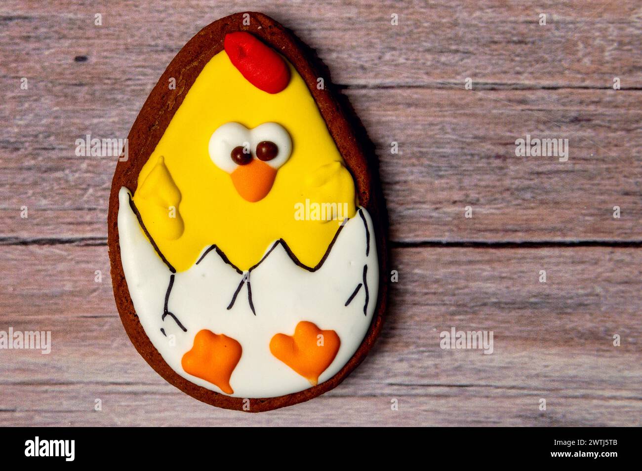Easter gingerbread cookie on  wooden table. Cookies for Easter Stock Photo