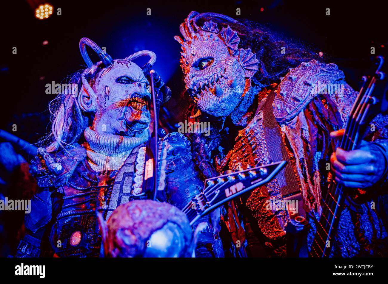 Copenhagen, Denmark. 17th Mar, 2024. The Finnish hard rock band Lordi performs a live concert at Pumpehuset in Copenhagen. Here guitarist Kone is seen live on stage with bass player Hiisi. (Photo Credit: Gonzales Photo/Alamy Live News Stock Photo