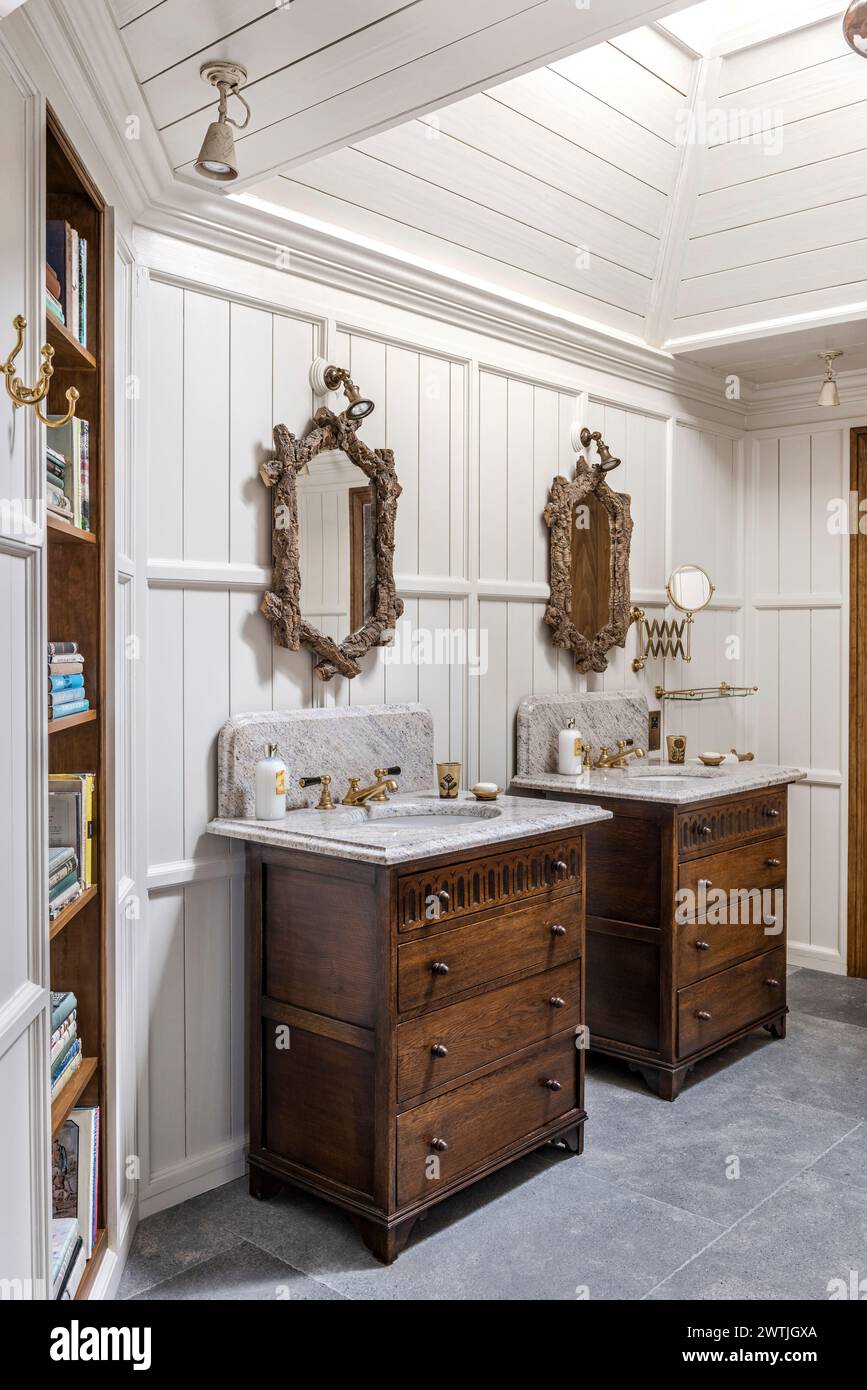 Pair of antique wooden wash stands with driftwood mirror frames in luxury hotel in Ardfin on the Isle of Jura, Inner Hebrides, Scotland, UK Stock Photo