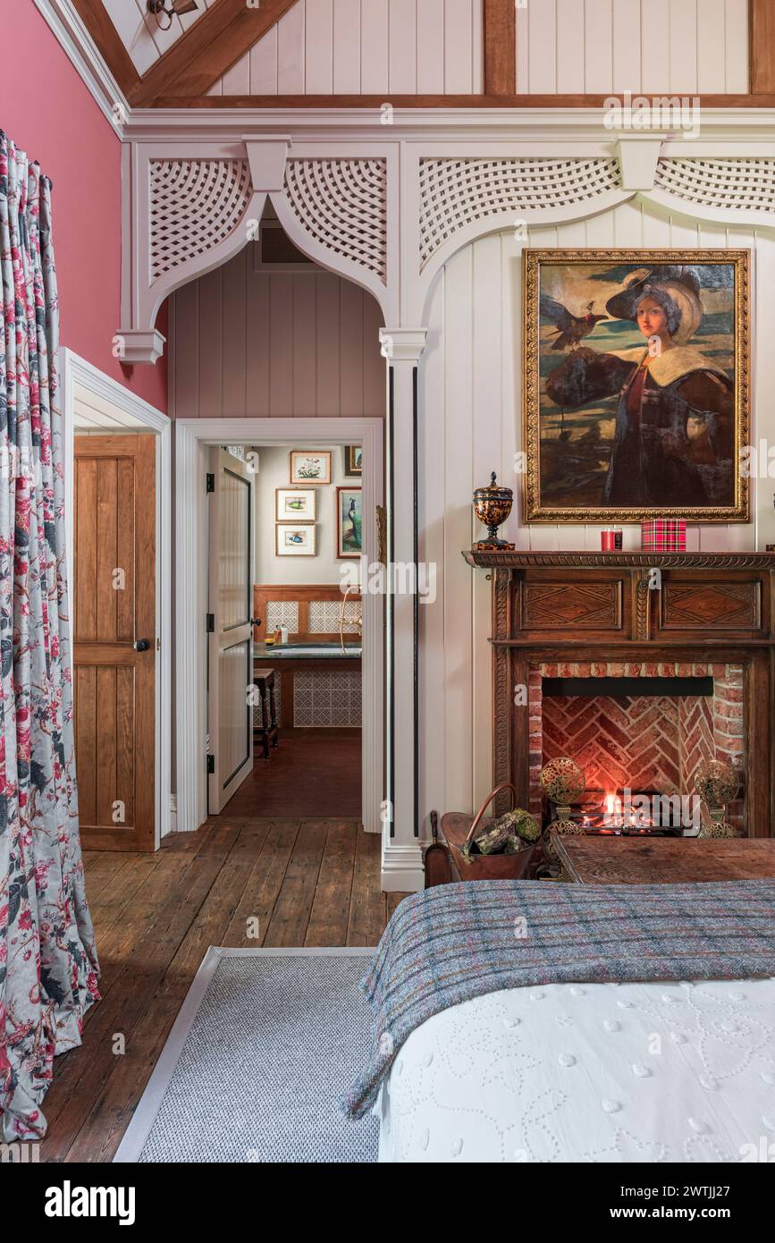 Moorish wall detail with lite fire in luxury hotel in Ardfin on the Isle of Jura, Inner Hebrides, Scotland, UK Stock Photo