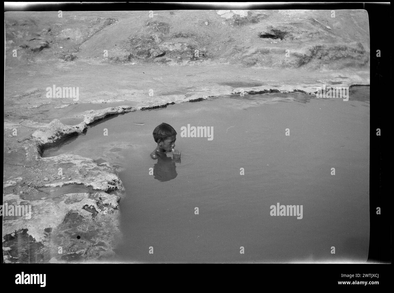 [Boy in thermal pool] gelatin silver negatives, black-and-white negatives Stock Photo