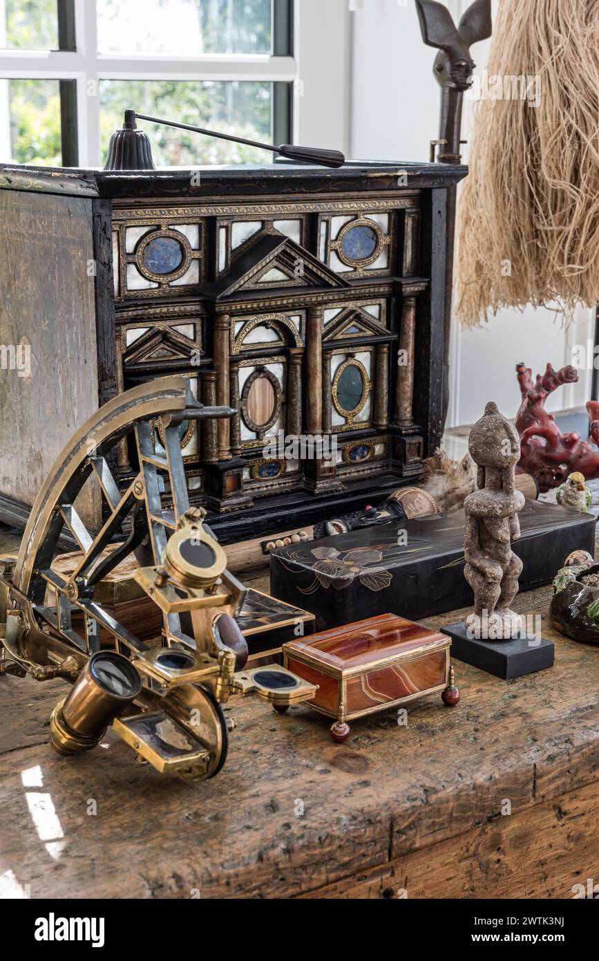 Antique collectables and old fashioned microscope in Irish home in Greystones, County Wicklow, Ireland Stock Photo
