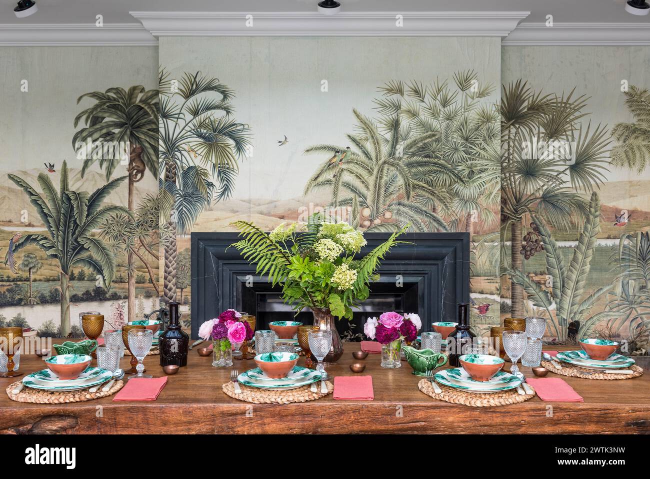 Tropical wallpaper with palm trees in dining room of Irish home in Greystones, County Wicklow, Ireland Stock Photo