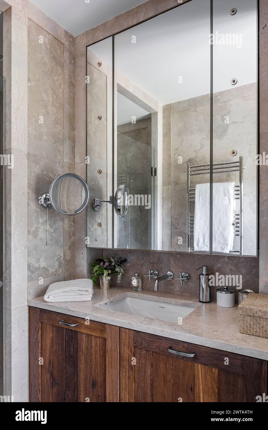 Mirrored bathroom cabinet in Irish home, Greystones, County Wicklow, Ireland. Stock Photo