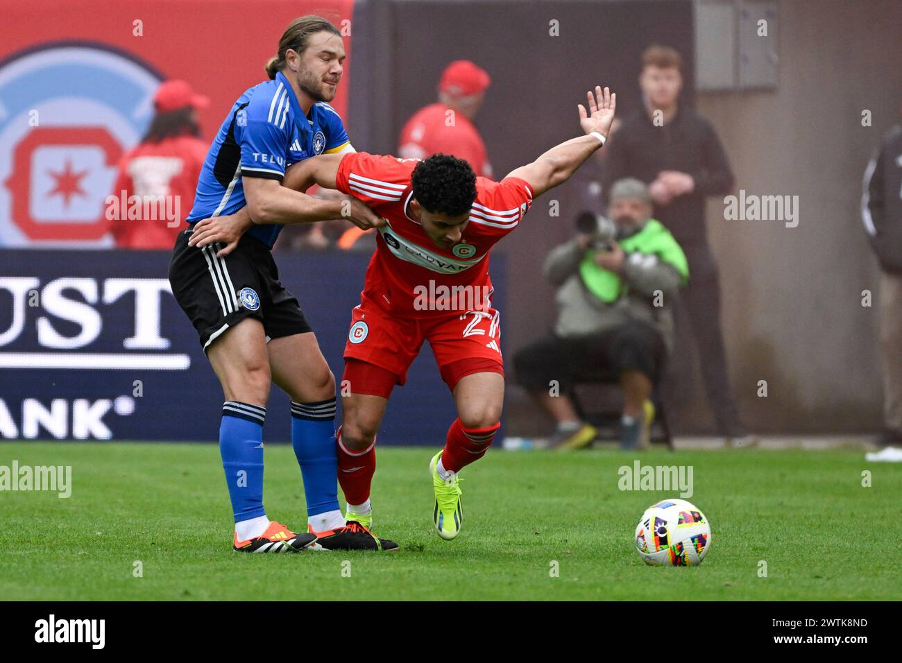 CF Montréal midfielder Samuel Piette (6) and Chicago Fire defender Allan Arigoni (27) during the first half of an MLS soccer match, Saturday, March 16, 2024, in Chicago. (AP Photo/Matt Marton) Stock Photo