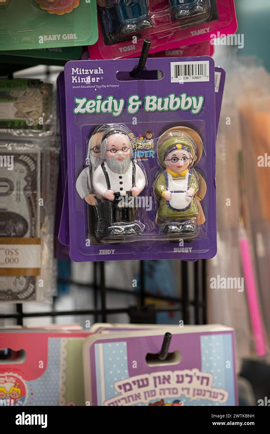 A toy for aimed at Hasidic Jewish children. Mini dolls of grandpa & grandma using Yiddish words. At Foodoo Kosher Supermarket in Brooklyn, New York. Stock Photo