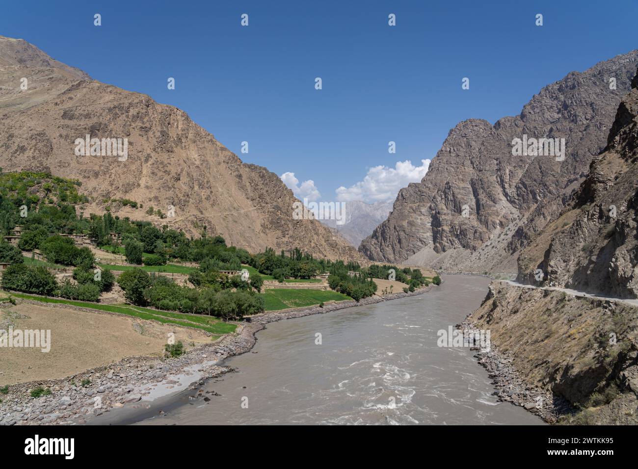 Scenic mountain landscape view along Pamir Highway of Panj river valley separating Tajikistan and Afghanistan, Darvaz, Gorno-Badakhshan, Tajikistan Stock Photo