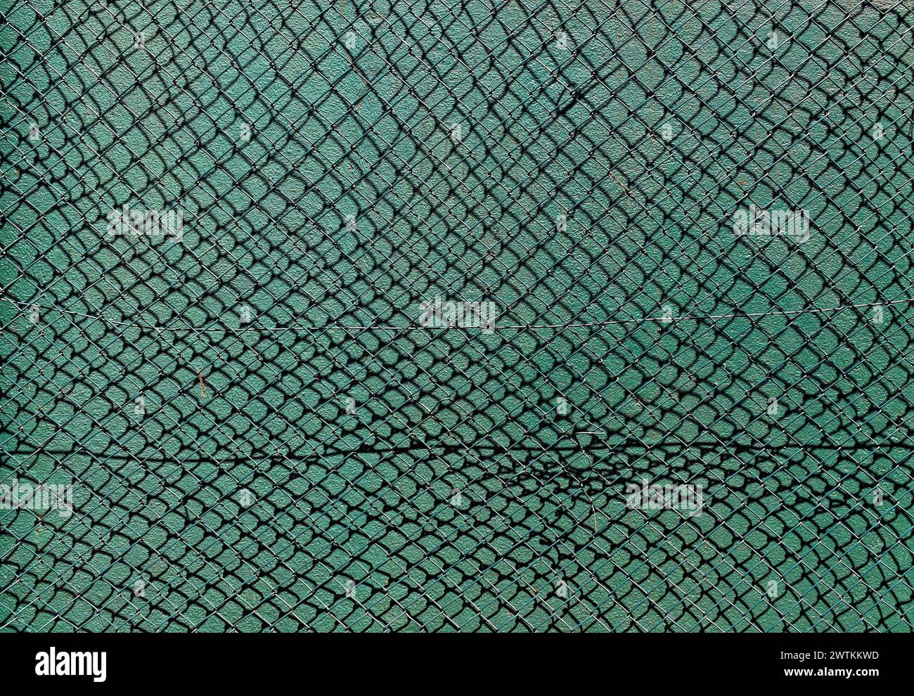 Green mesh, rhombus grid on green background Stock Photo