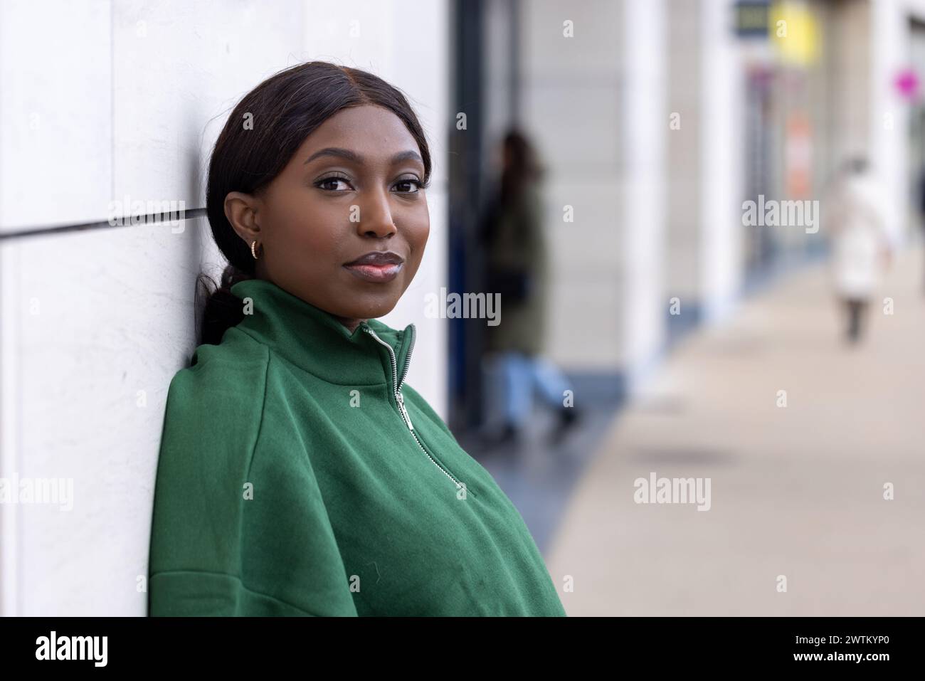Soft smile relaxed posture hi-res stock photography and images - Alamy