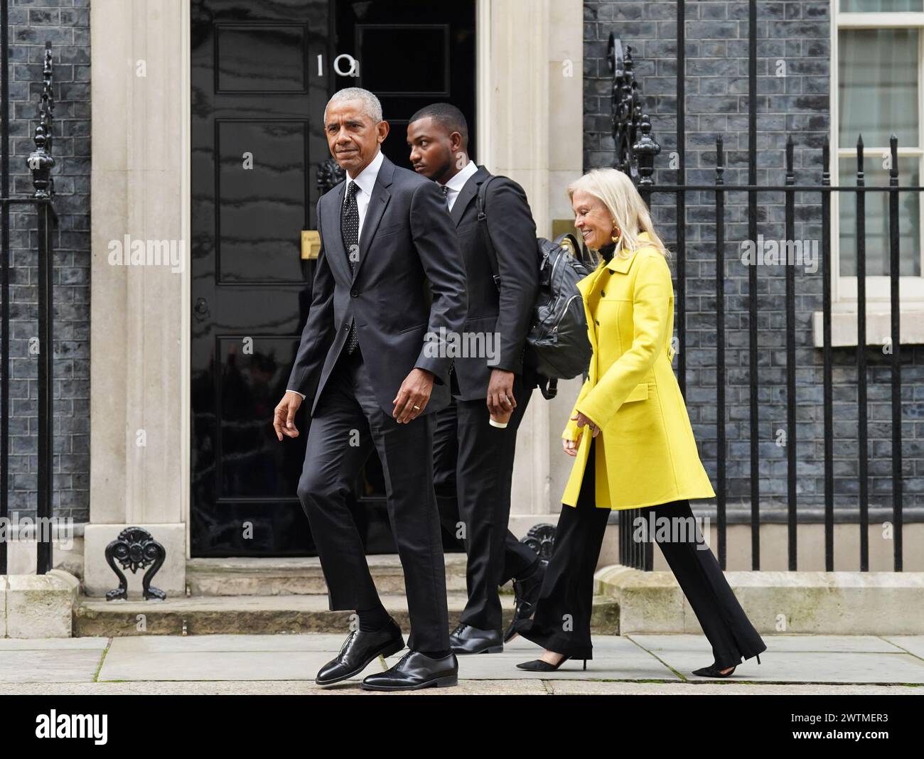 Former US president Barack Obama followed by United States ambassador to the United Kingdom Jane Hartley, leave following a meeting at 10 Downing Street, London. Picture date: Monday March 18, 2024. See PA story POLITICS Obama. Photo credit should read: Stefan Rousseau/PA Wire Stock Photo