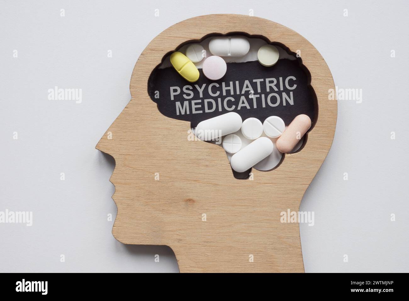 Model Of A Head With Pills And An Inscription Psychiatric Medication