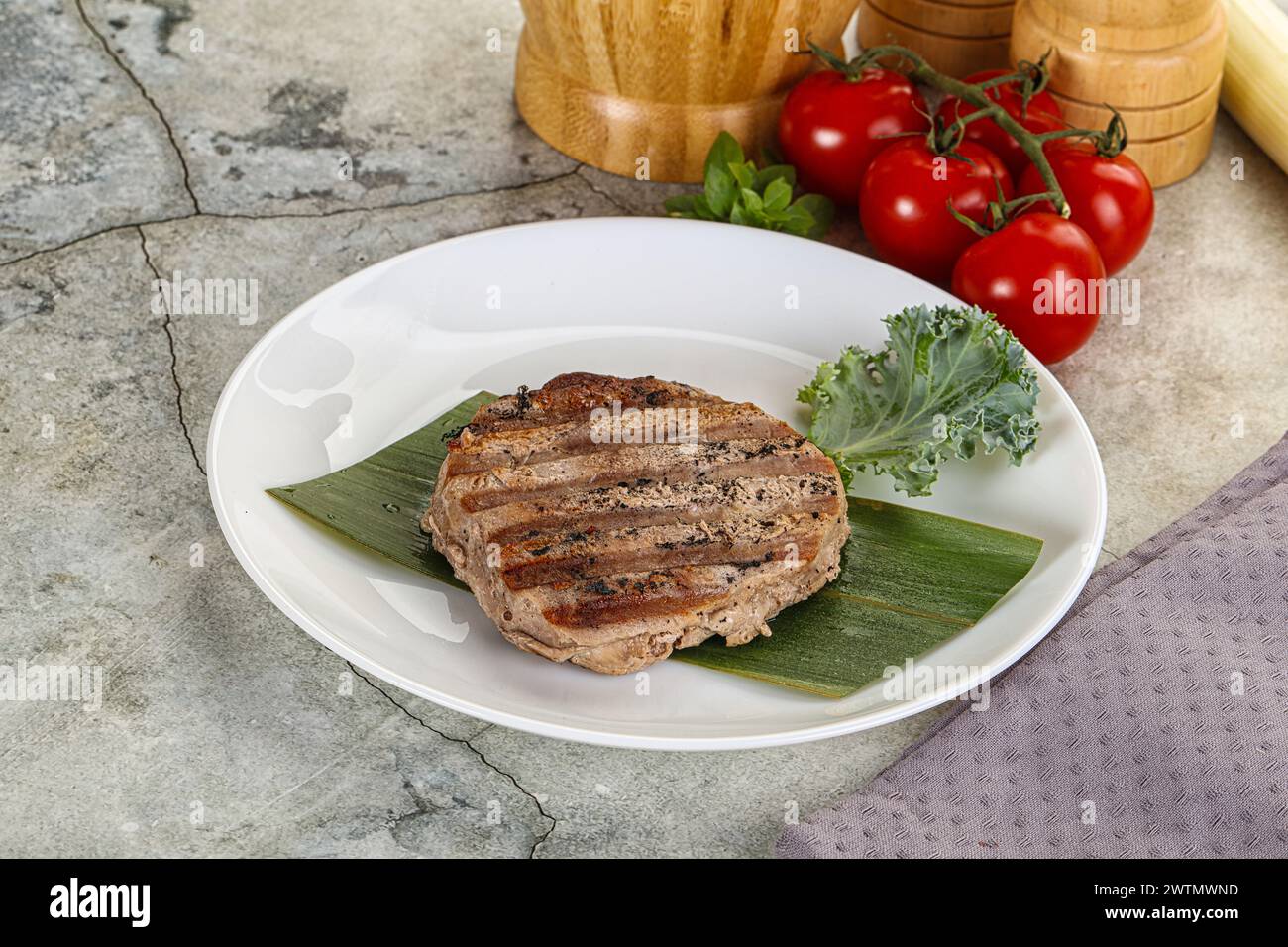 Grilled tuna medallion in the plate with spices Stock Photo Alamy