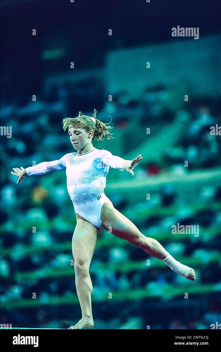 Kim Zmeskal (USA) competing in the women's artistic team all-around ...