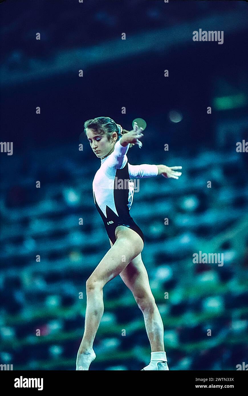 Eva Rueda Elena Grudneva (EUN) competing in the women's artistic team all-around ...