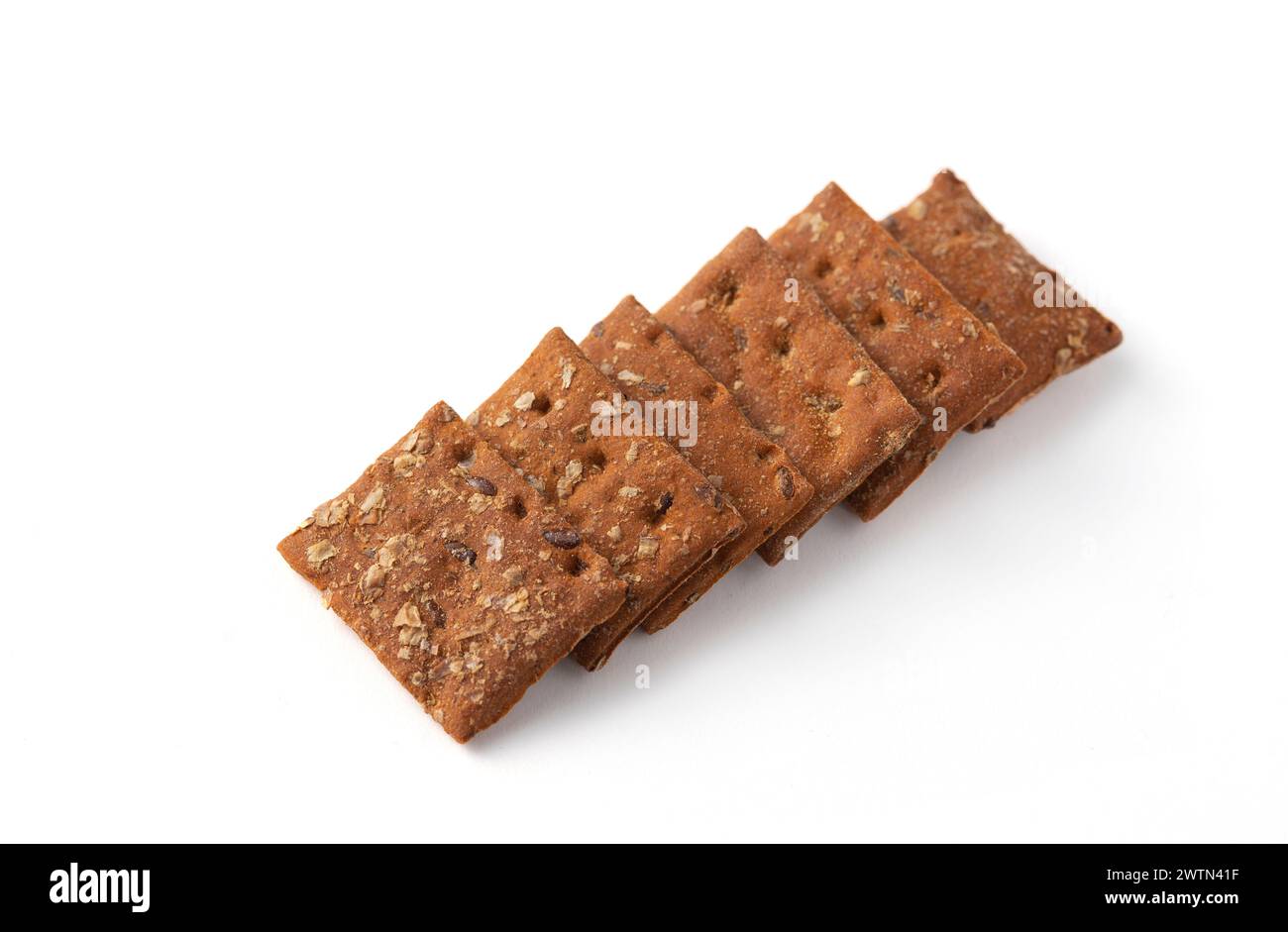 snack mini cracker with tomato and basil isolated on white background. Stock Photo