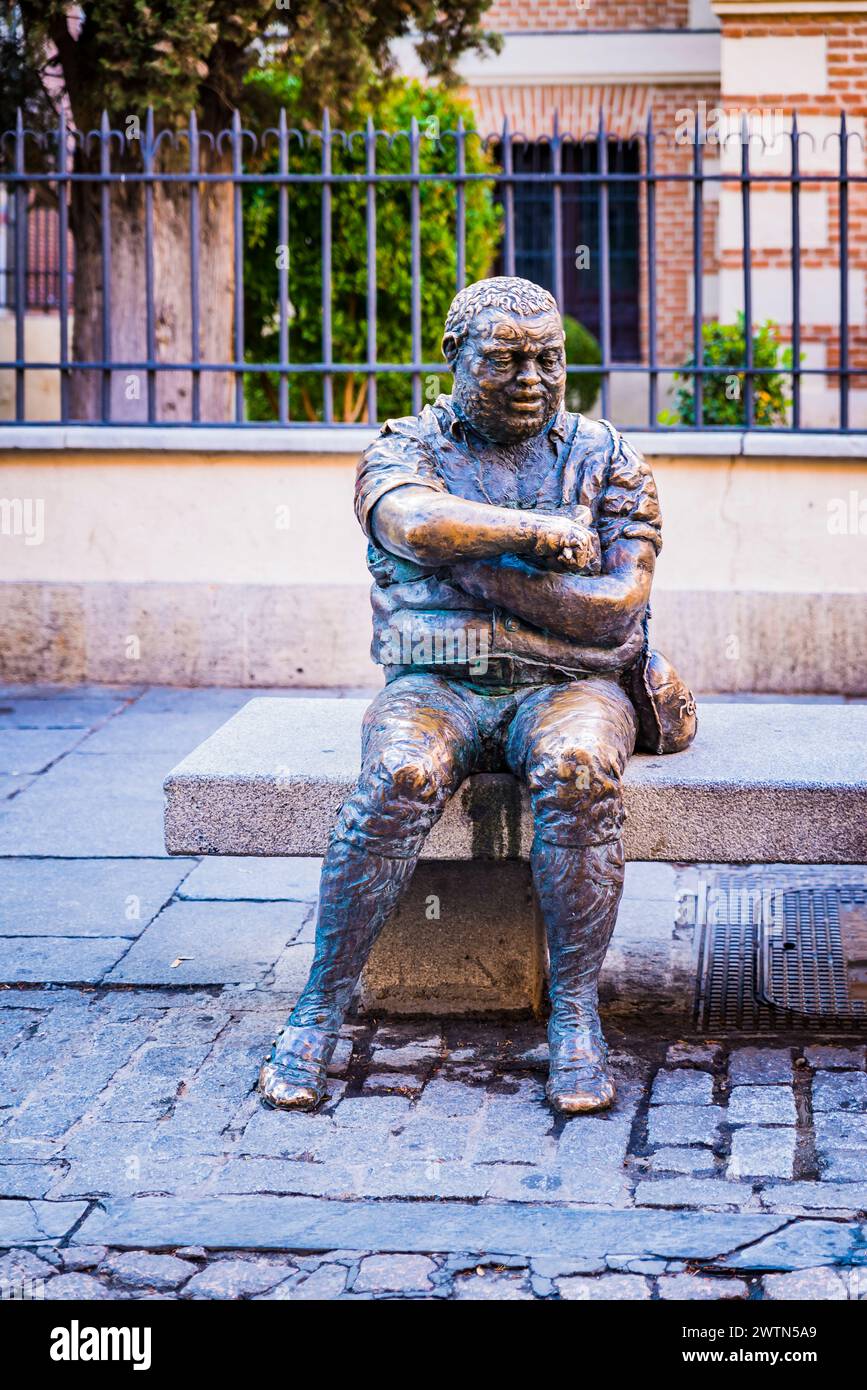 Detail of the character of Sancho Panza. Sculpture group of Don Quixote and Sancho in front of Cervantes Birthplace Museum. Alcalá de Henares, Comunid Stock Photo