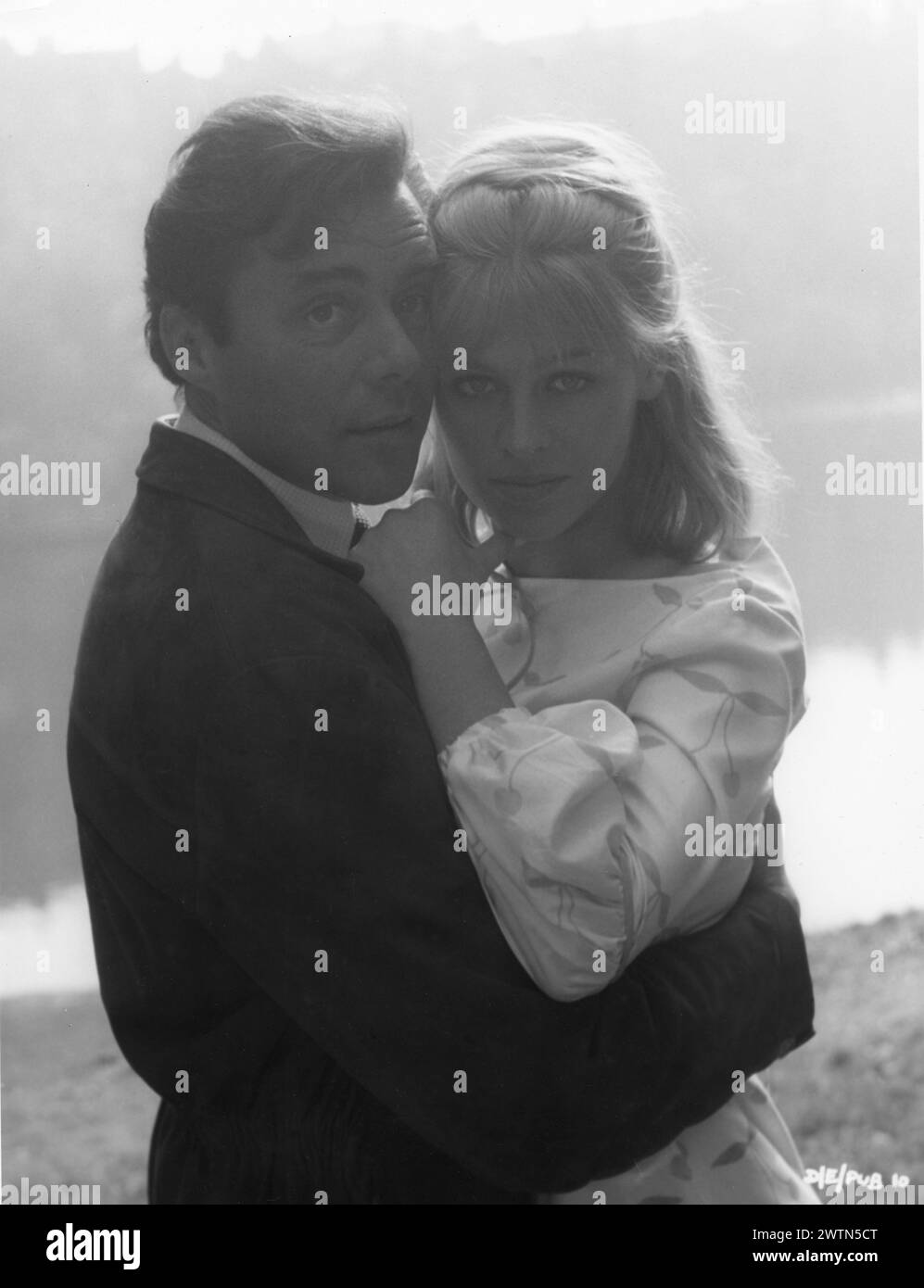 British Actress JULIE CHRISTIE and DIRK BOGARDE in a portrait from DARLING 1965  Director JOHN SCHLESINGER  Screenplay FREDERIC RAPHAEL Costume Design JULIE HARRIS Music JOHN DANKWORTH Vic-Appia Films / Anglo Amalgamated Stock Photo