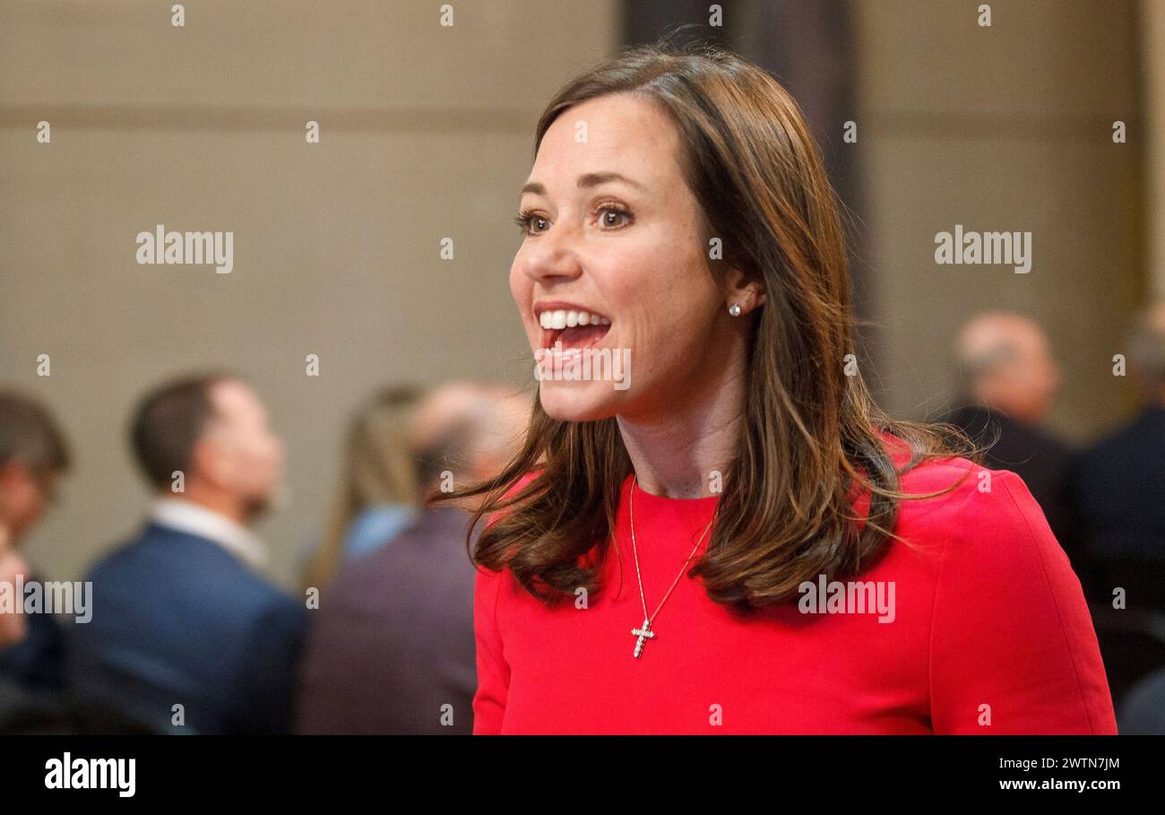Sen. Katie Britt reacts as she arrives as she visits Singin' River Live