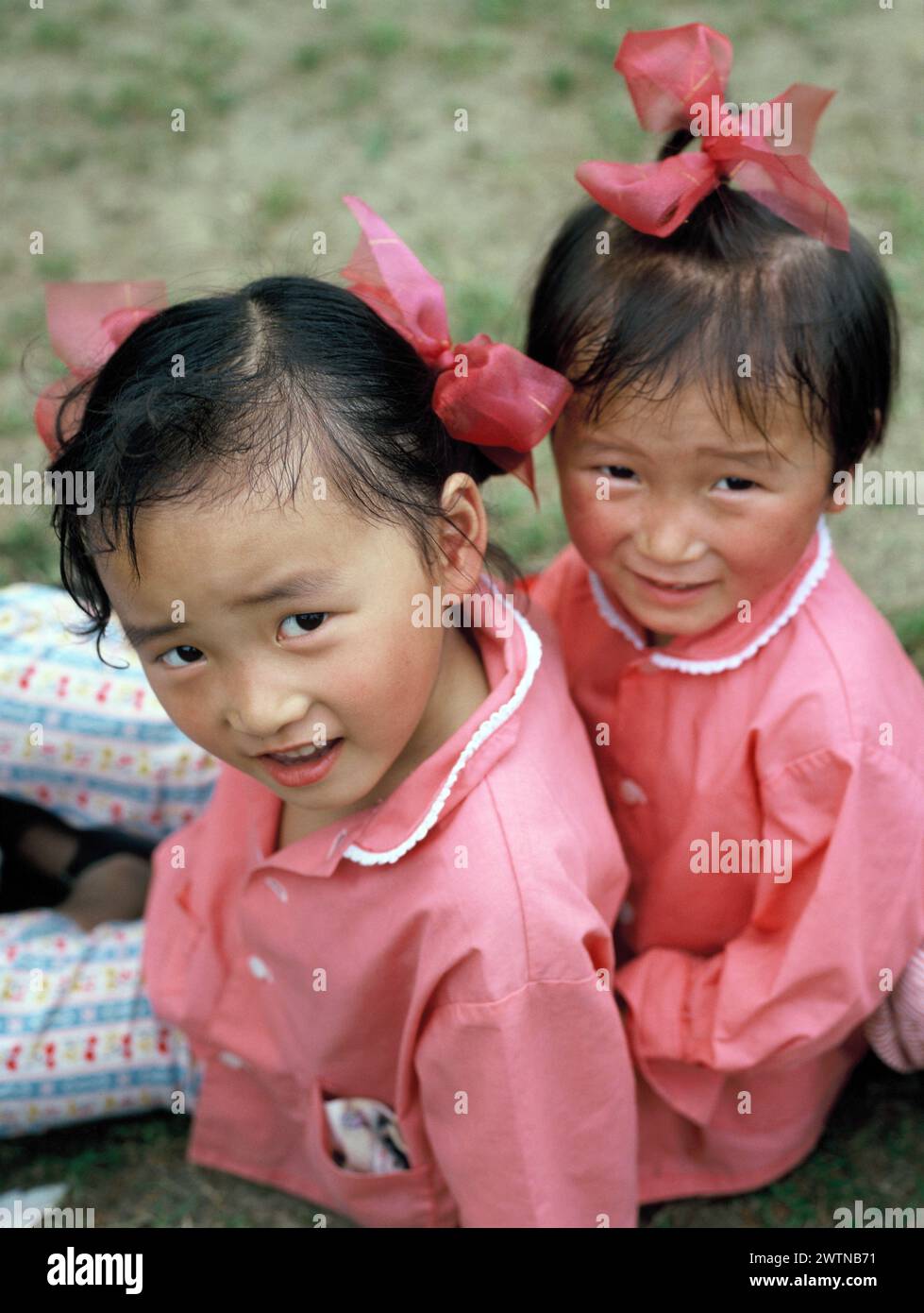 China. Shanghai. Local children. Little girls outdoors. Stock Photo
