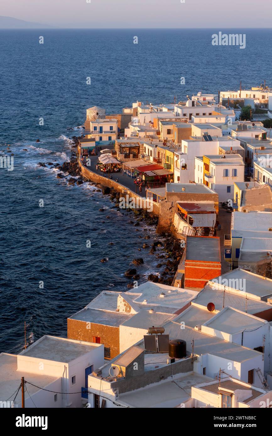 Panoramic view during blue hour of Mandraki village, a beautiful, traditional village, capital of Nisyros island, in Dodecanese islands, Greece. Stock Photo
