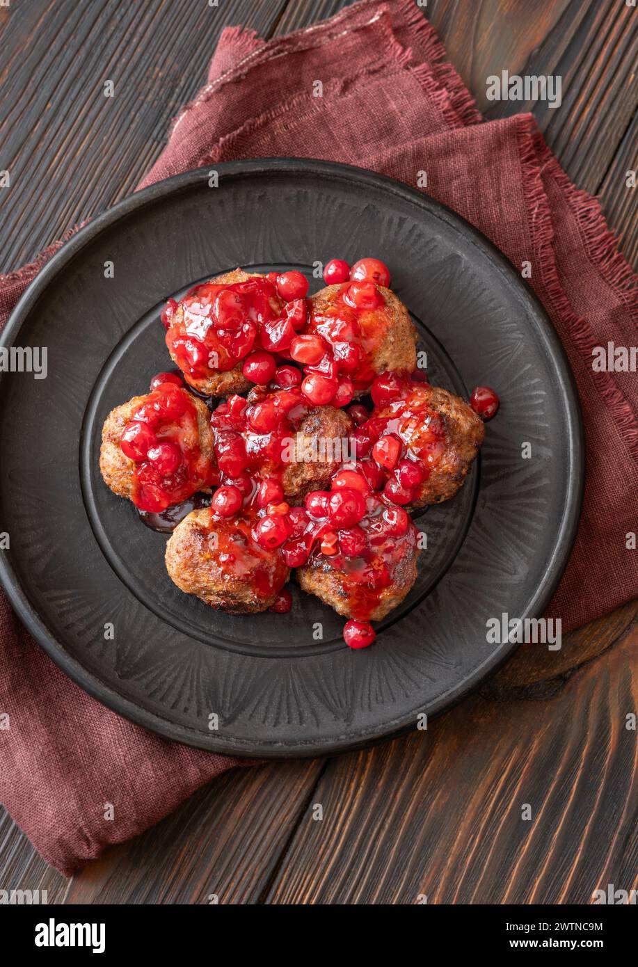 Portion of swedish meatballs with lingonberry sauce Stock Photo