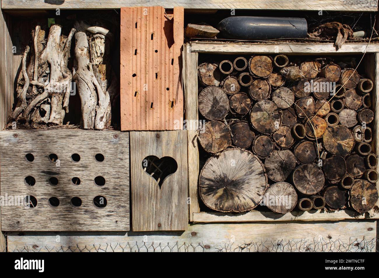 Insect hotel made from recycled material. hotel for pollinating insects ...