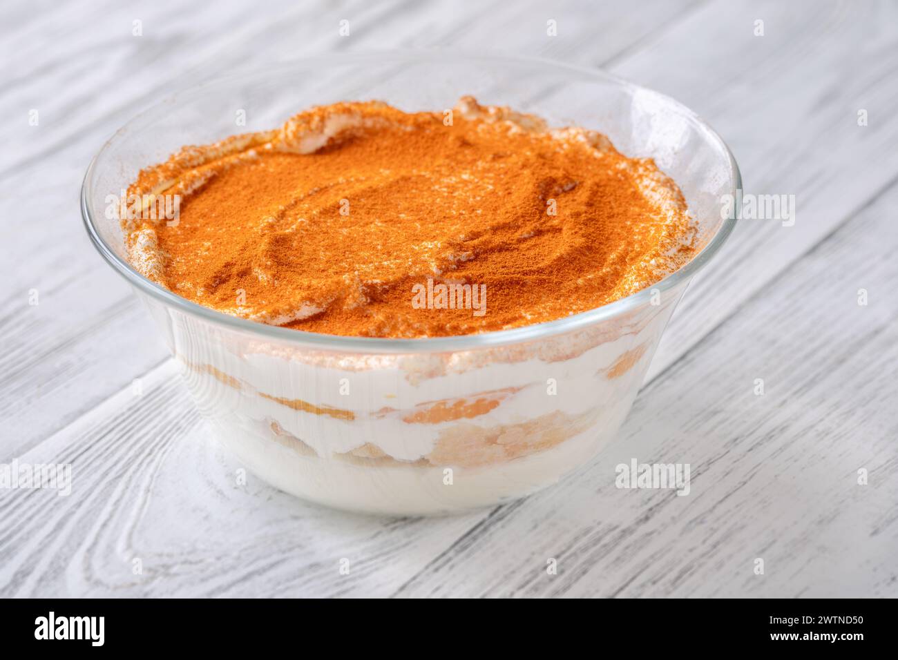 Bowl of mandarin orange tiramisu on the table Stock Photo