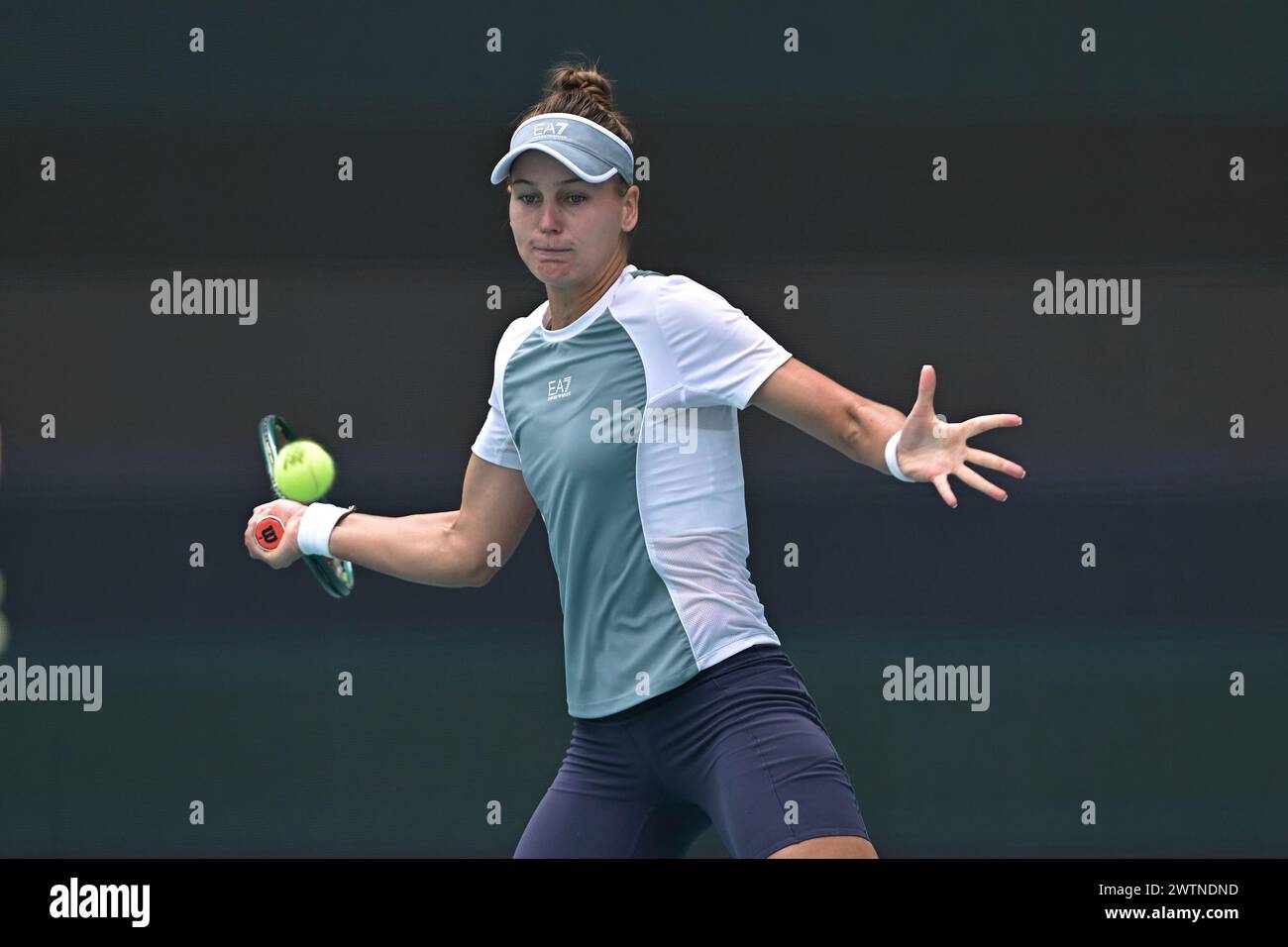 MIAMI GARDENS, FL - MARCH 18: Veronika Kudermetova (RUS) hits the ball ...