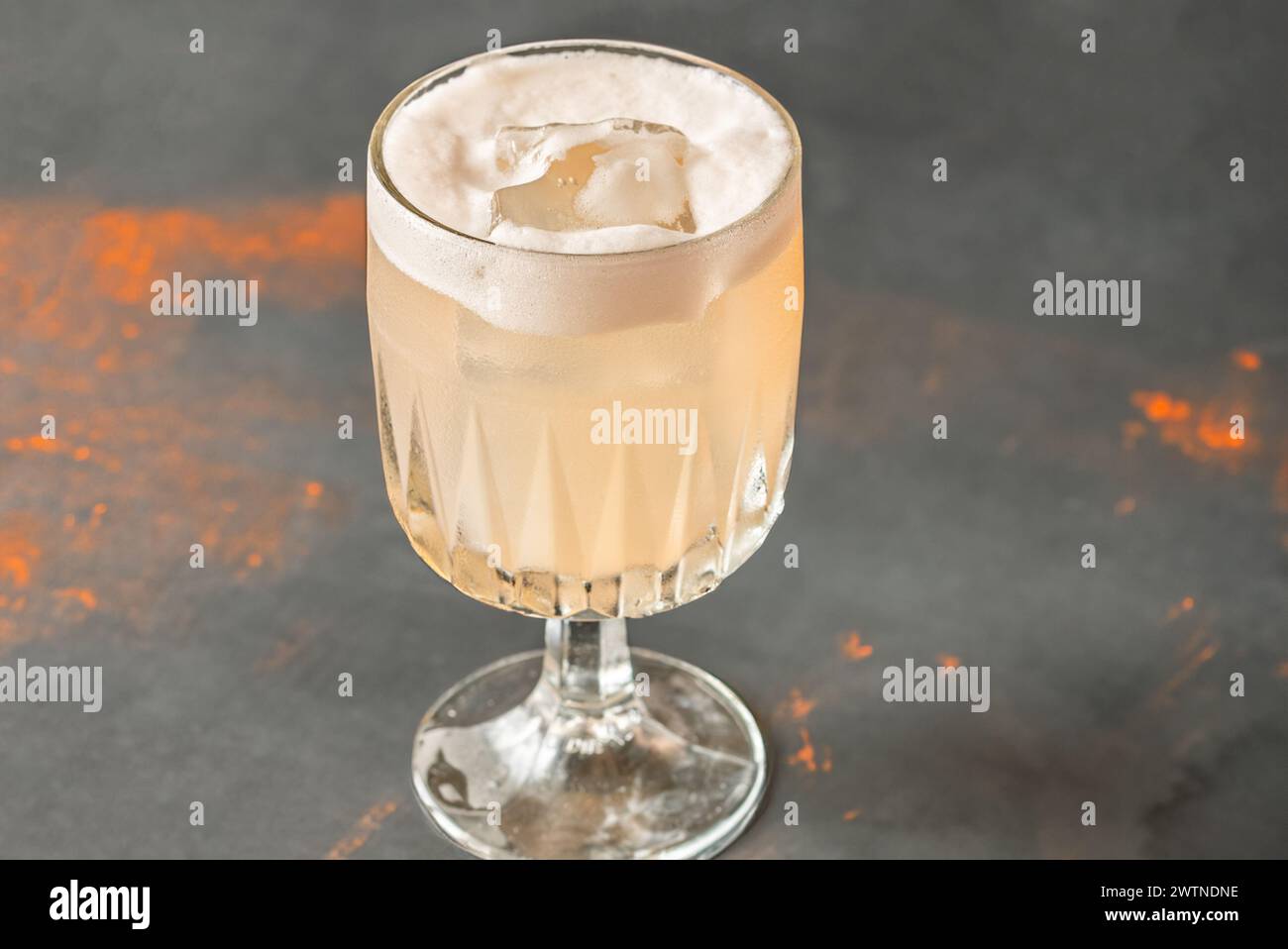 Goblet glass of Grapefruit tequila sour cocktail Stock Photo Alamy