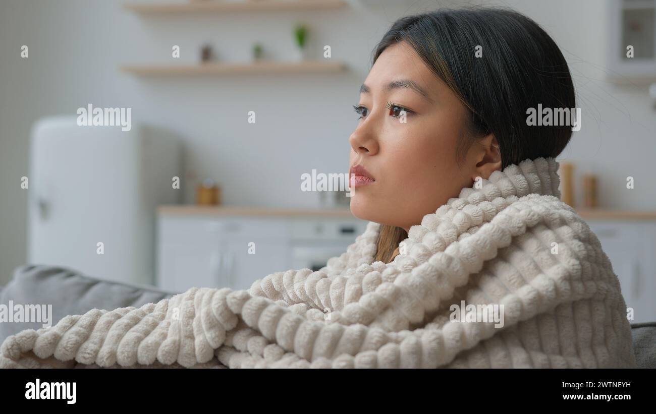 Depressed woman wrapped in hi-res stock photography and images - Alamy