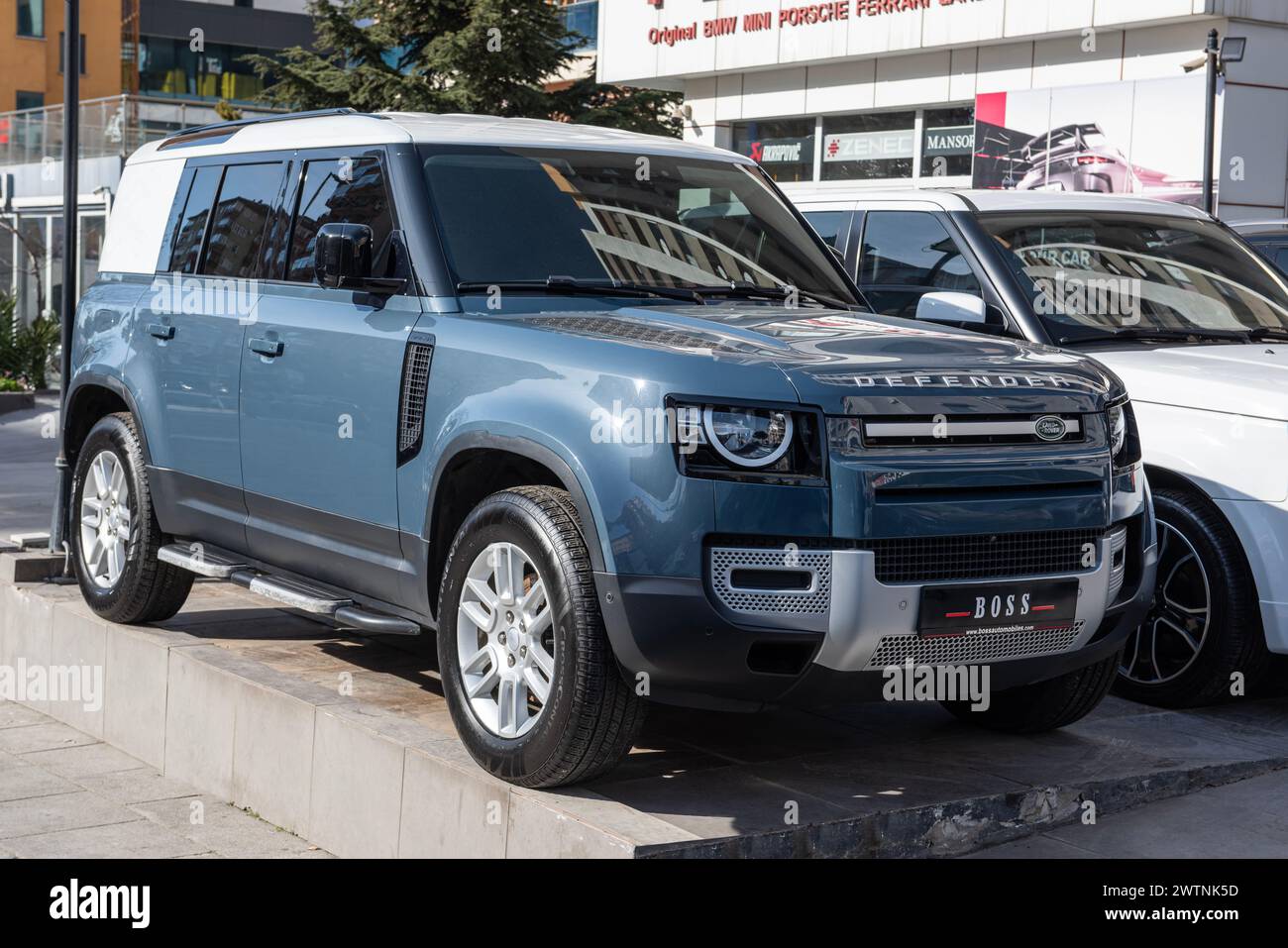 ISTANBUL, TURKEY - MARCH 10, 2024: Land Rover Defender on the showroom. British-built, multi-purpose and powerful Off-Road vehicles have had a say in Stock Photo