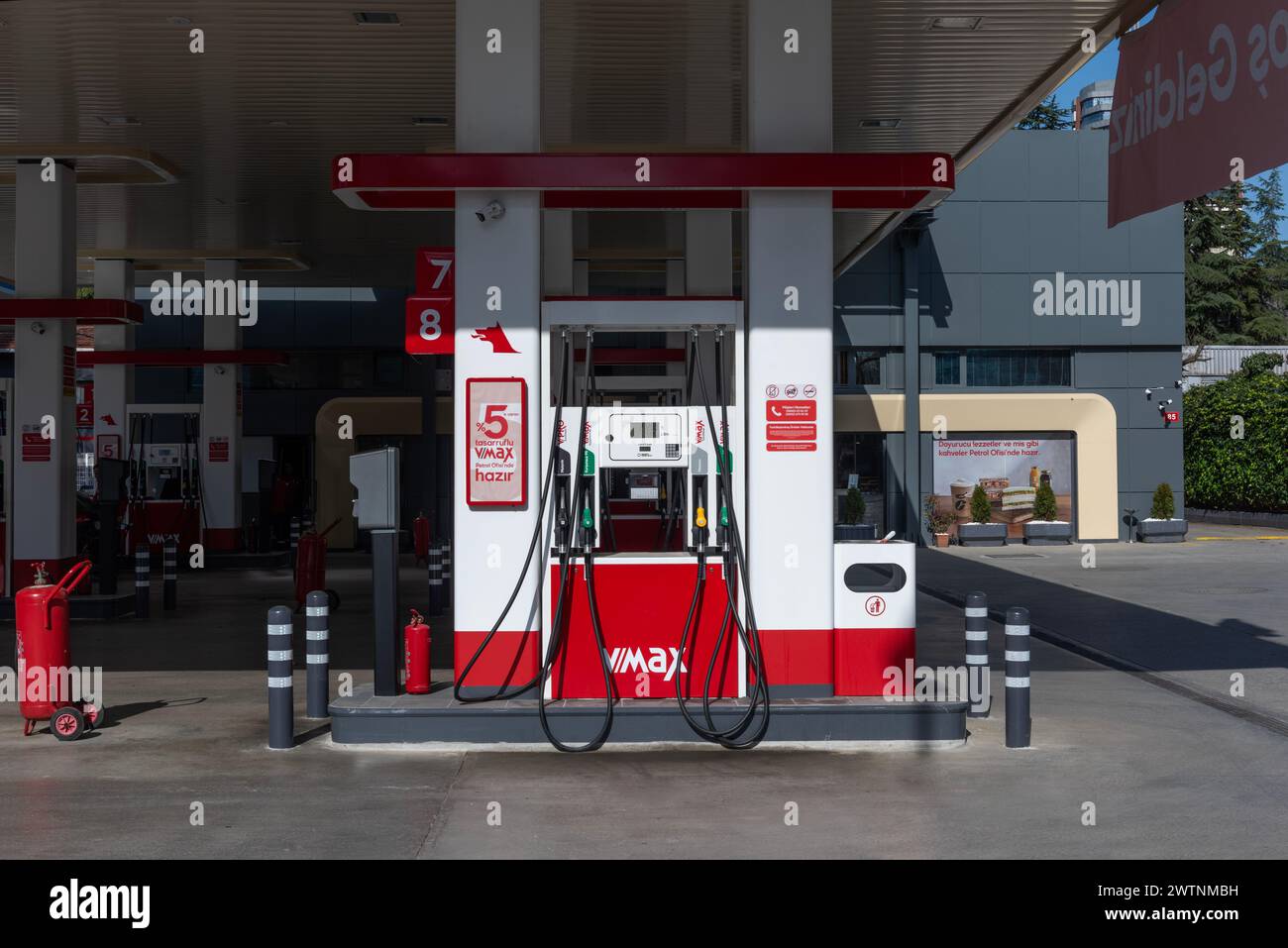 ISTANBUL, TURKEY - MARCH 12, 2024: Red petrol station of the Ofisi company is in center of city. The Petrol Ofisi is a fuel products distribution and Stock Photo